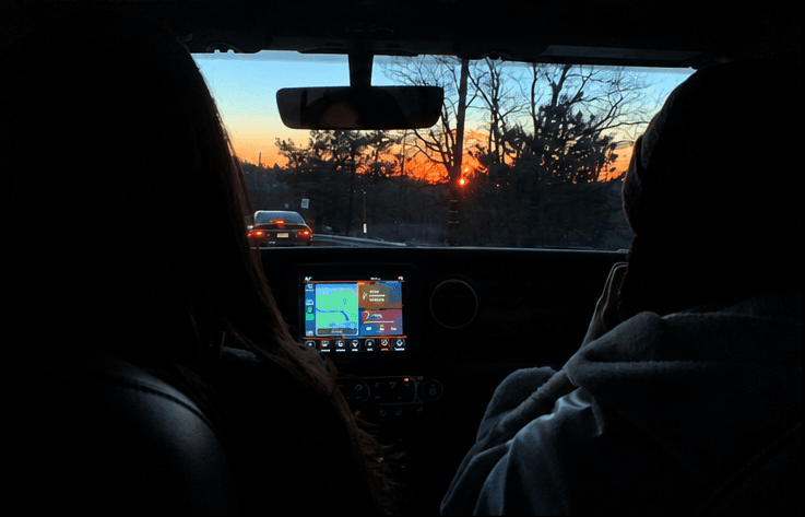 techie members driving to their retreat at sunset